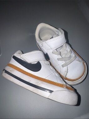 Nike White Kids Sneakers with Black Swoosh and Brown Trim